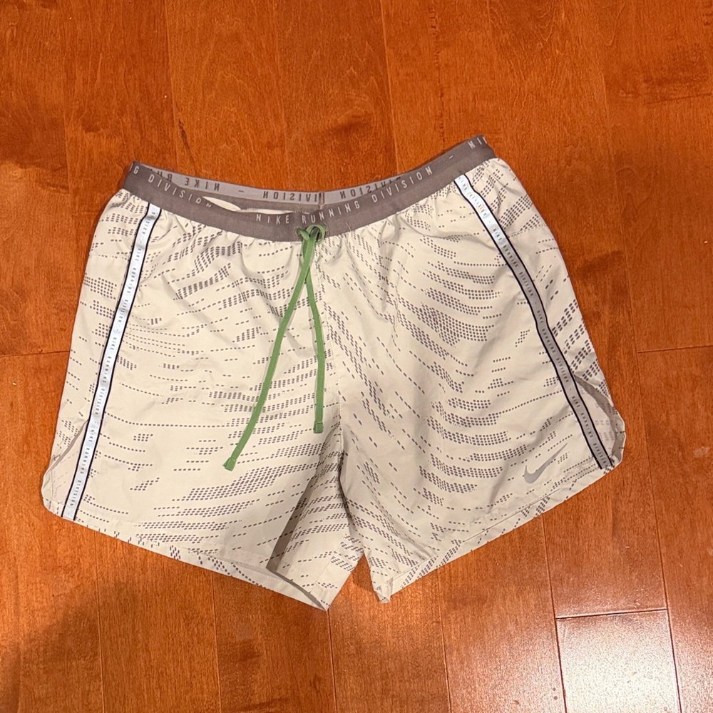 Nike Tan Patterned Shorts with Green Drawstring